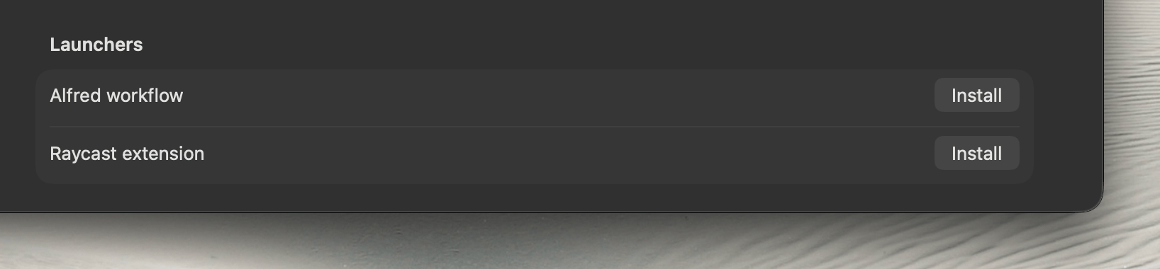 The Alfred workflow and Raycast extension rows in Cling's Settings